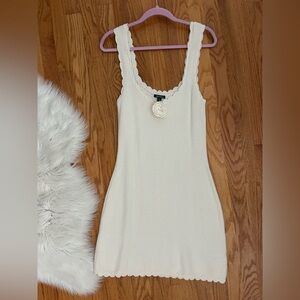 Wild Fable white mini crochet dress with flower detail!